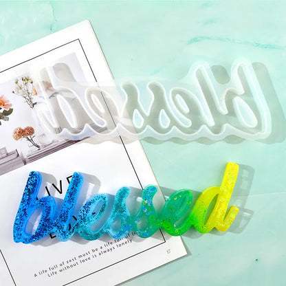 Silicone epoxy mould for resin crafts showing English mirror letters with love word designs in irregular shapes