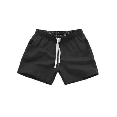 Men's summer surf shorts in various colors, made from 100% polyester for quick drying and durability