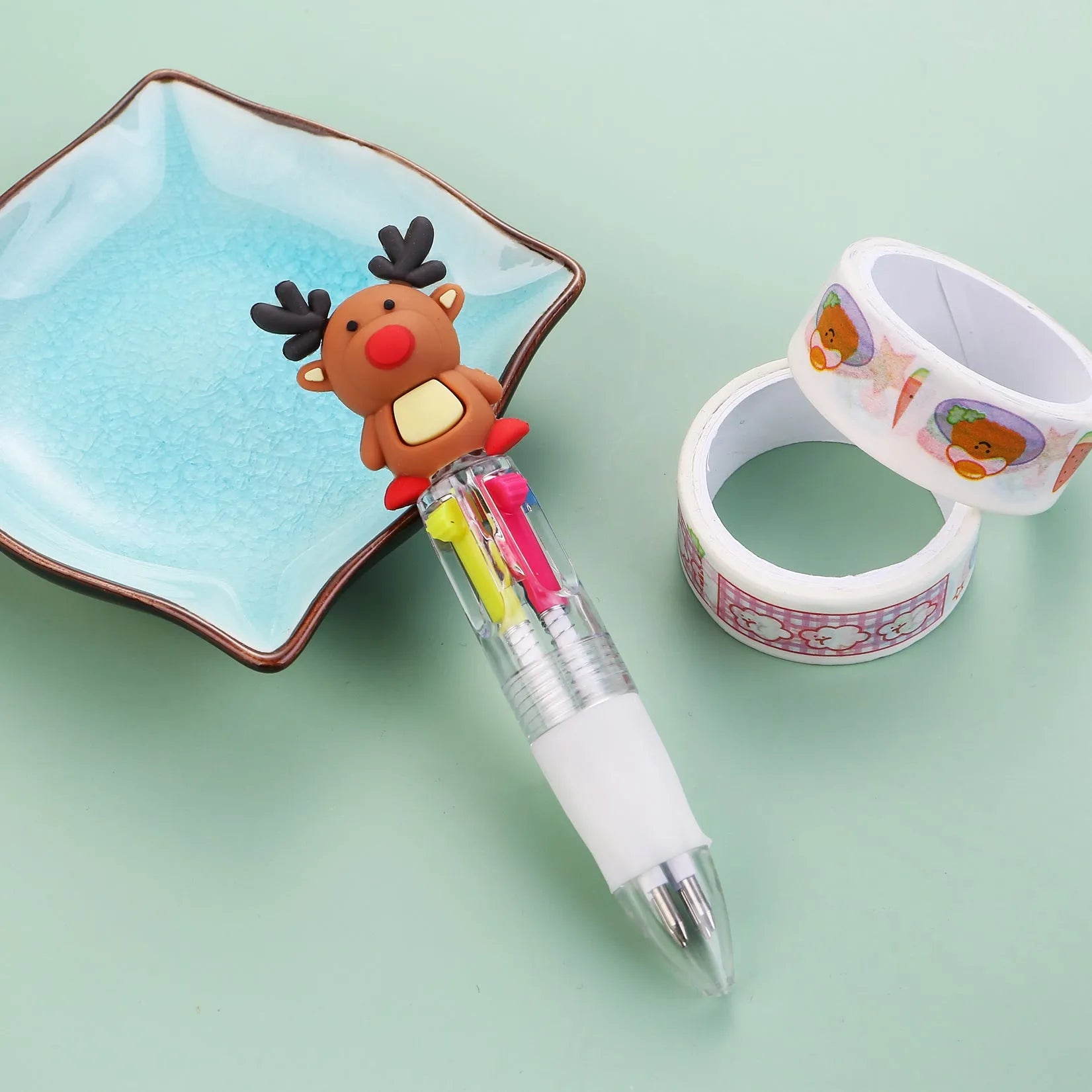 Christmas four-colour ballpoint pen with press mechanism showing festive designs