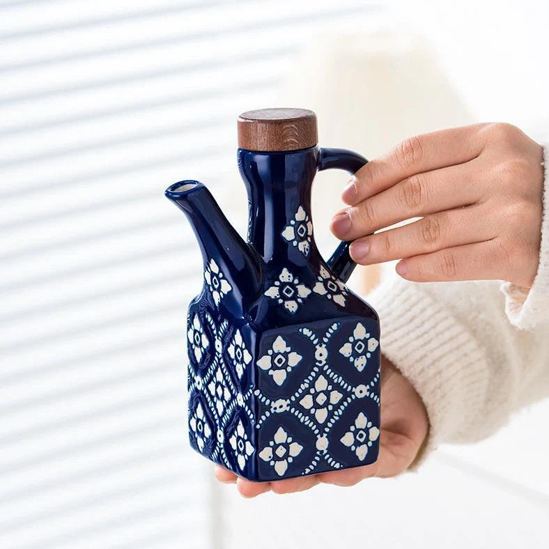 Ceramic oil pot with automatic shut-off, 520ml capacity, printed floral design in blue or wine red