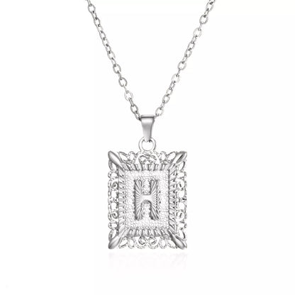 Personalized initial letter necklace in gold or steel, featuring any letter from A to Z
