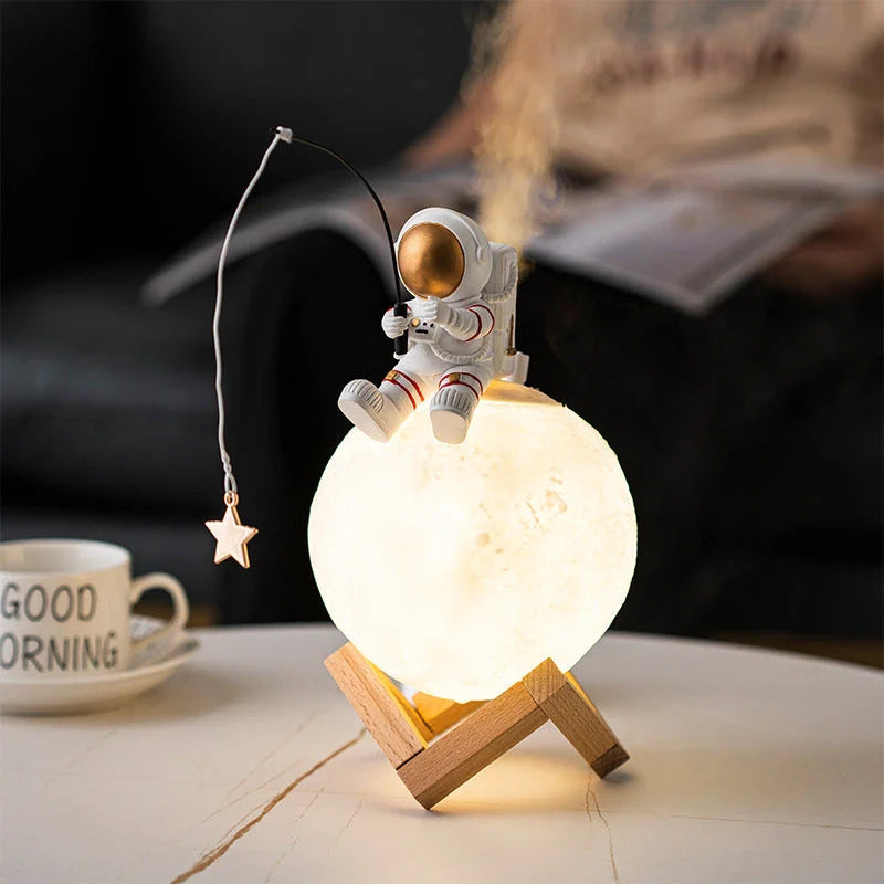Elegant astronaut figurine with humidifier and night light features, perfect for modern home decor