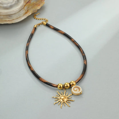 Geometric leopard print pendant on a stainless steel chain necklace for women.