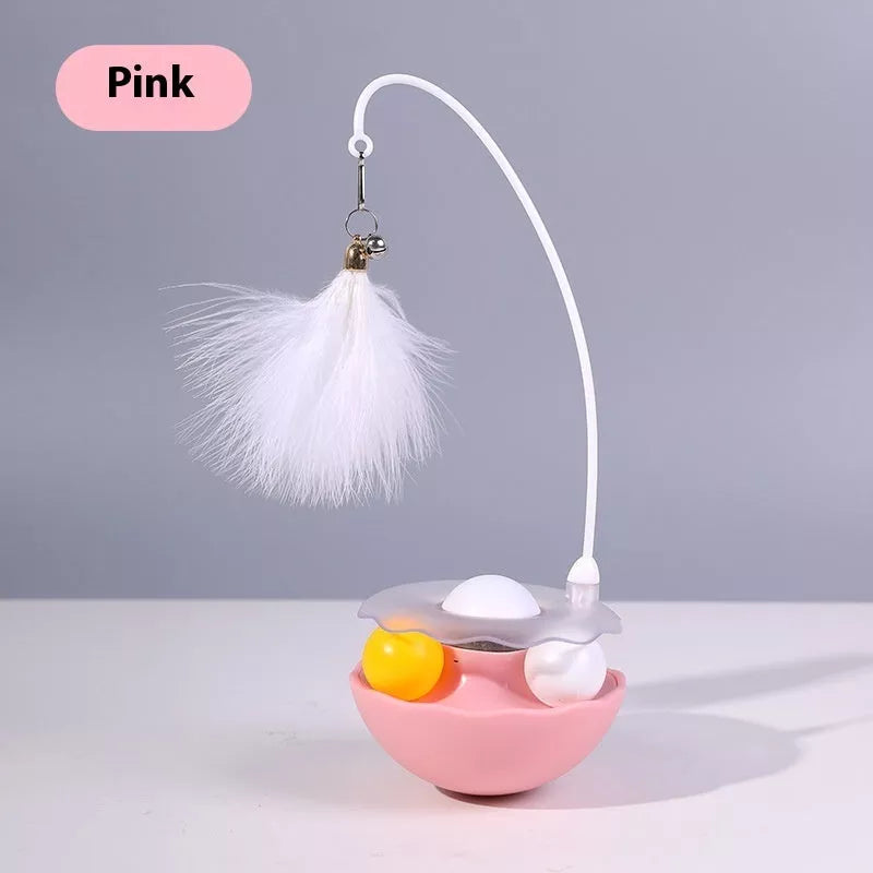 Interactive cat toy with catnip, feather wand, and spinning balls in white, indigo, fluorescent yellow, and pink