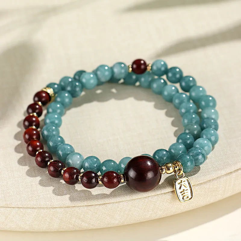 Natural stone blue women's beaded bracelet with geometric shapes and Chinese Fu and Xi characters.