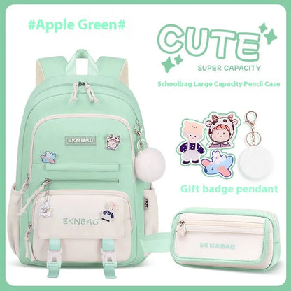 Pink waterproof Oxford cloth school backpack for girls with curved shoulder straps, shown with matching pencil case.