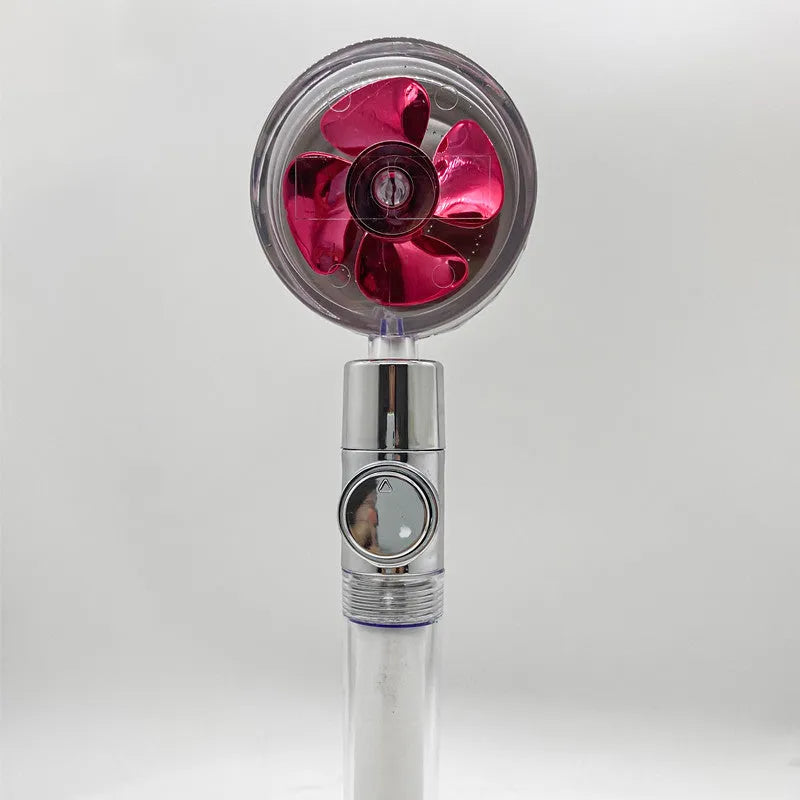 Chrome-finished ABS plastic water-saving shower head with a round, rotating spray head.