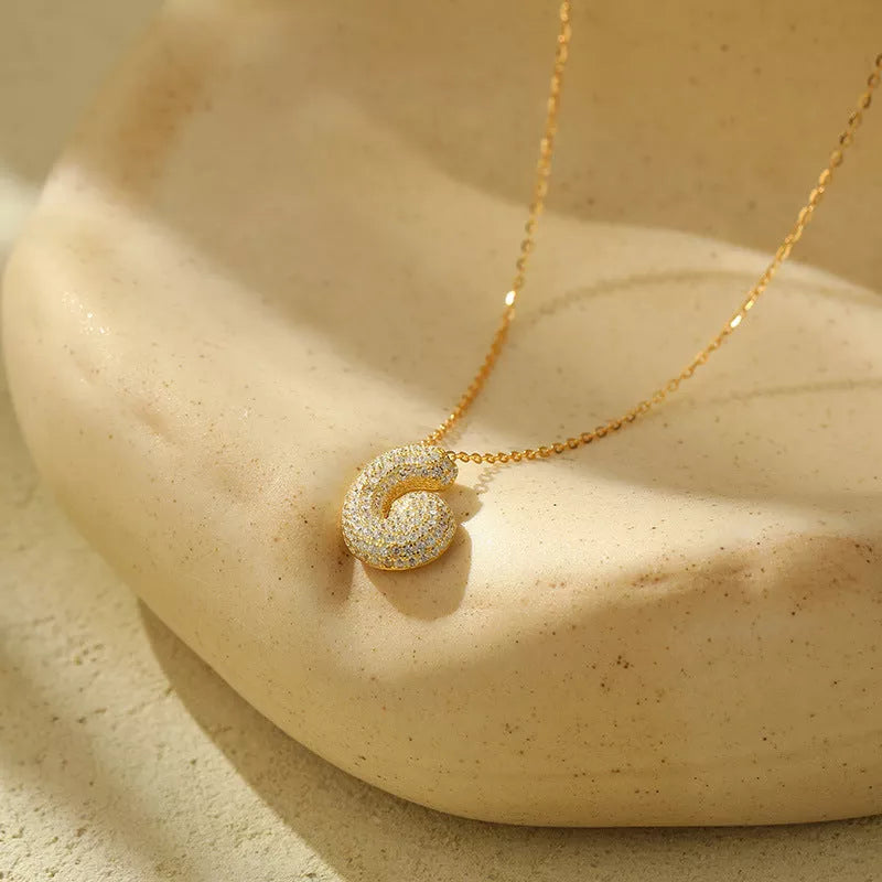 Stainless steel initial pendant necklace with zircon accents, personalized with your choice of letter.