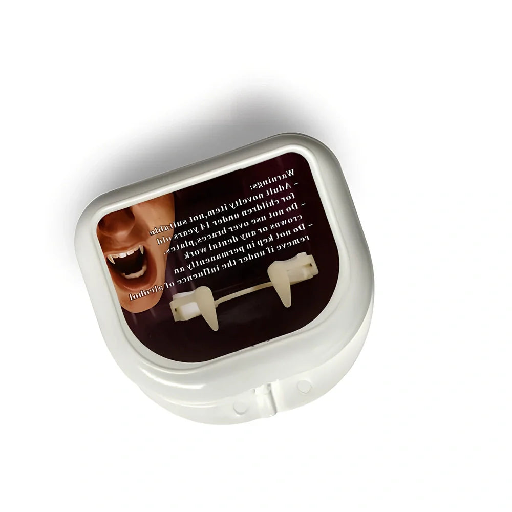 Retractable vampire teeth showing extended 2cm fangs with spring mechanism