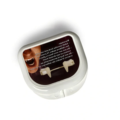 Retractable vampire teeth showing extended 2cm fangs with spring mechanism