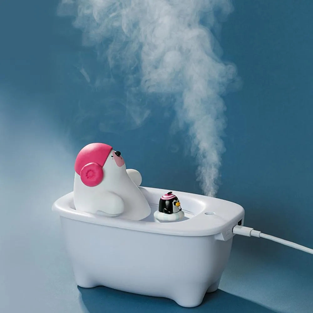 White USB air humidifier with 550ml water tank showing mist output and compact 176mm height design