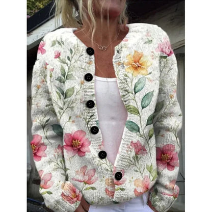 Yellow women's cardigan coat with a raised 3D digital print pattern, shown on a hanger.