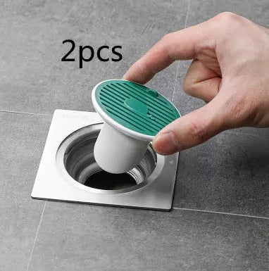 Whale Magnetic Suction Floor Drain Cover in white, orange, or green, blocking sewer odors with a tight seal