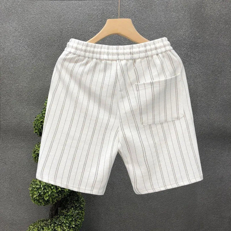 Men's black and white striped casual shorts with fleece lining, straight-leg cut, and ankle banding, shown in size M with waist 51cm