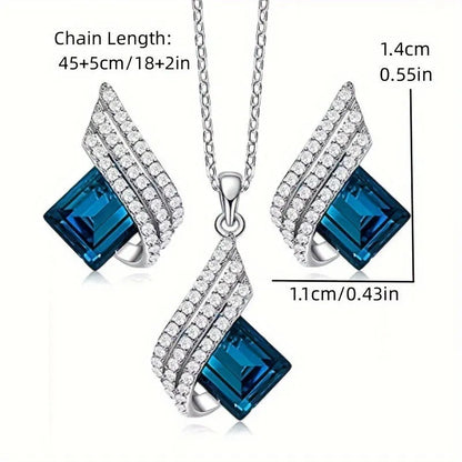 Women's alloy pendant and glass necklace with matching electroplated ear studs in cross chain style.