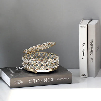 French gold iron jewellery box with crystal glass panels showing jewellery inside
