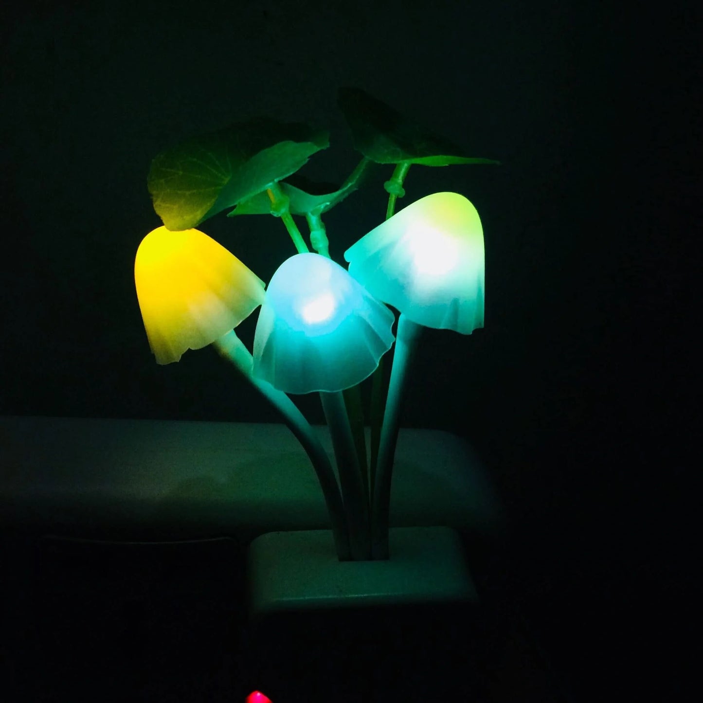 Color-changing LED mushroom night light with automatic sensor for home use