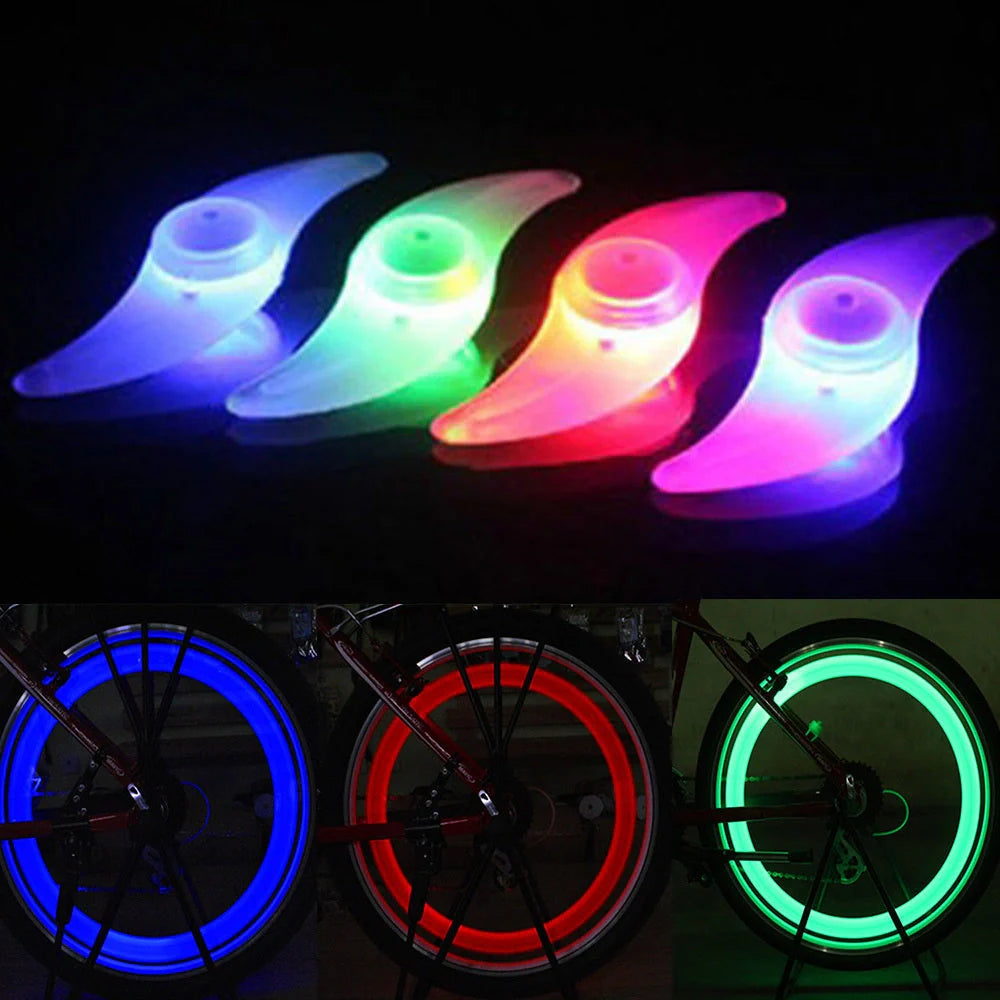 LED bicycle spoke lights in various colors mounted on bike wheel for night safety