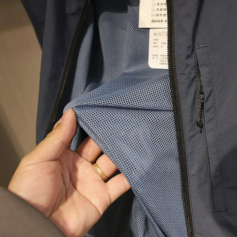 Men's navy blue quick-dry nylon vest cardigan with side pockets on a hanger