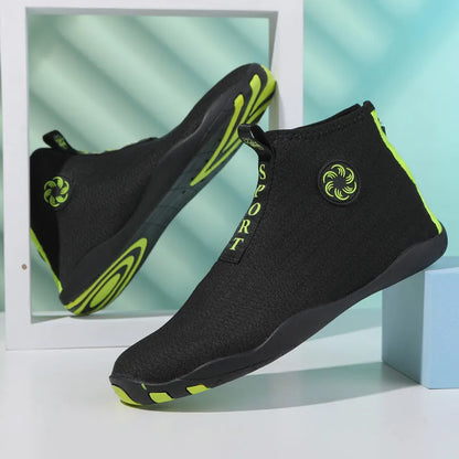 Casual mid-top beach shoes in black and fluorescent green with a mesh upper and rubber sole.