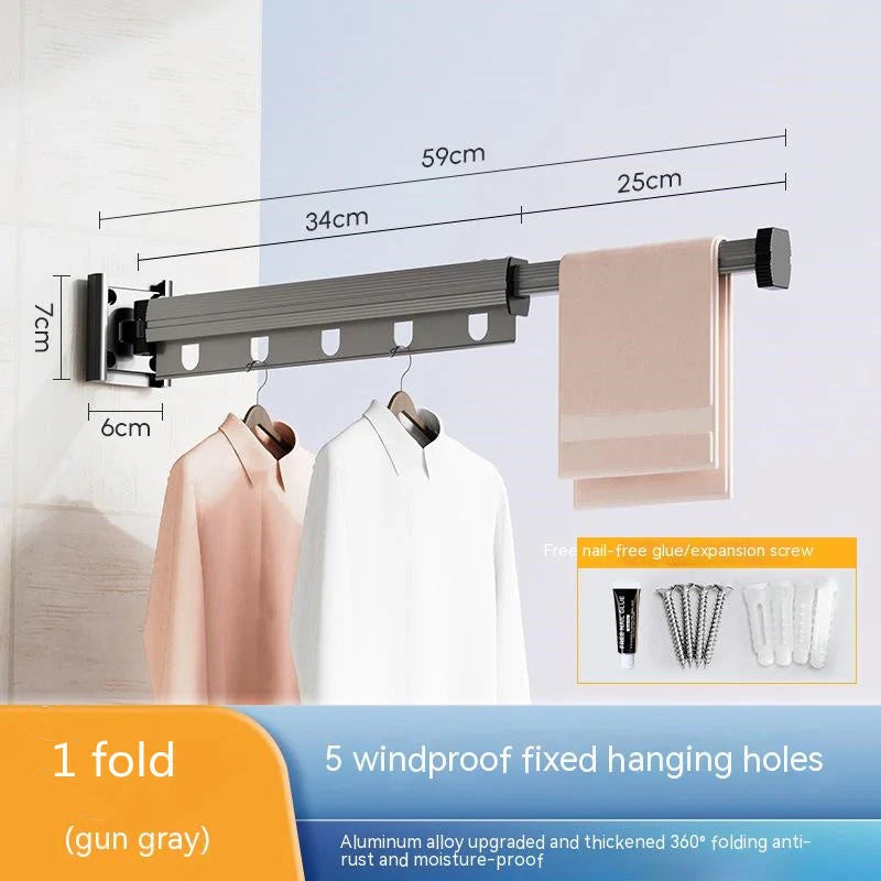 Aluminum retractable drying rack mounted on a window, extending outward for clothes drying