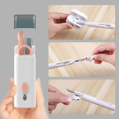Multifunctional white cleaning pen kit open to show silicone tip, brush, keycap puller, and spray bottle for electronics.