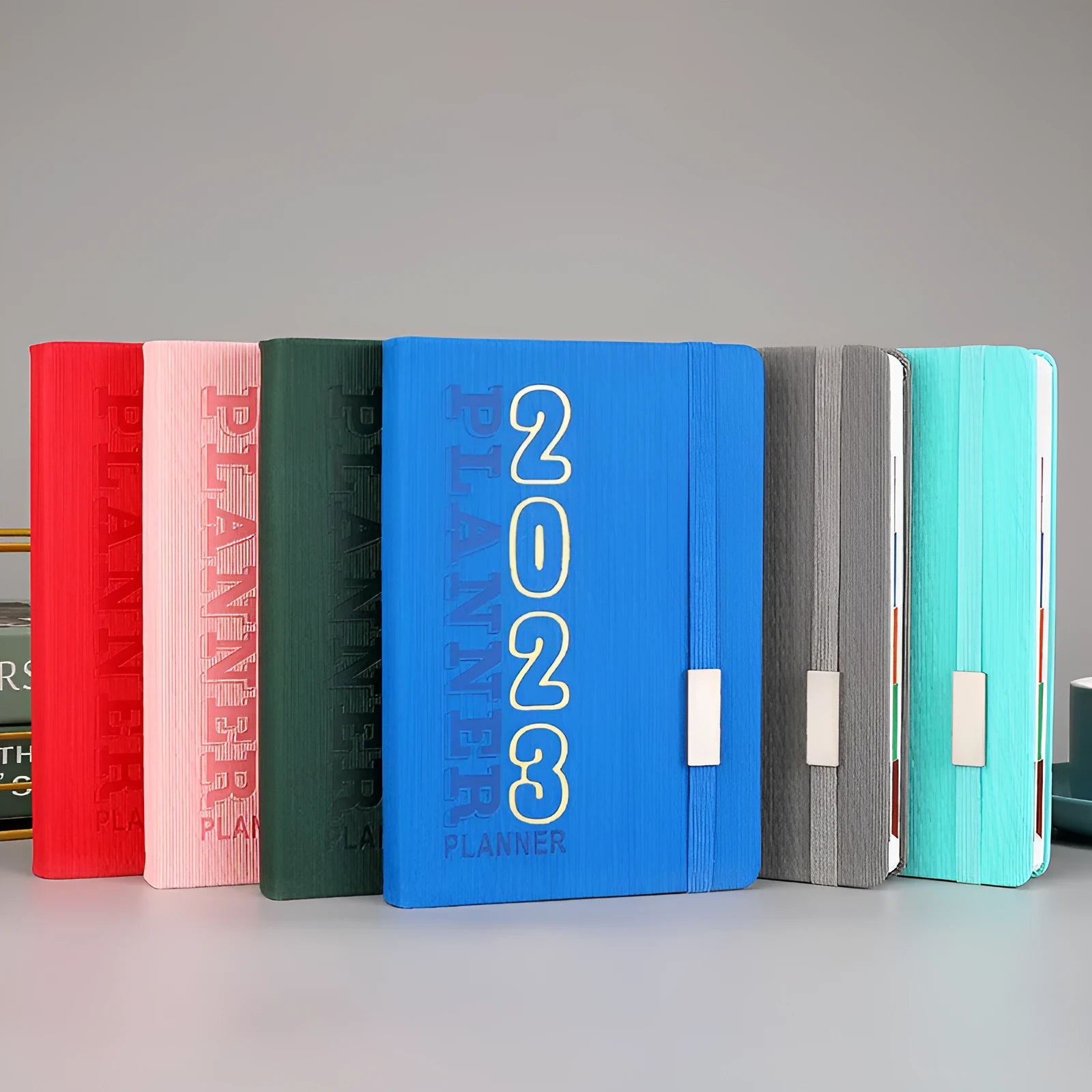 Creative student almanac diary with imitation leather cover open on a calendar page.