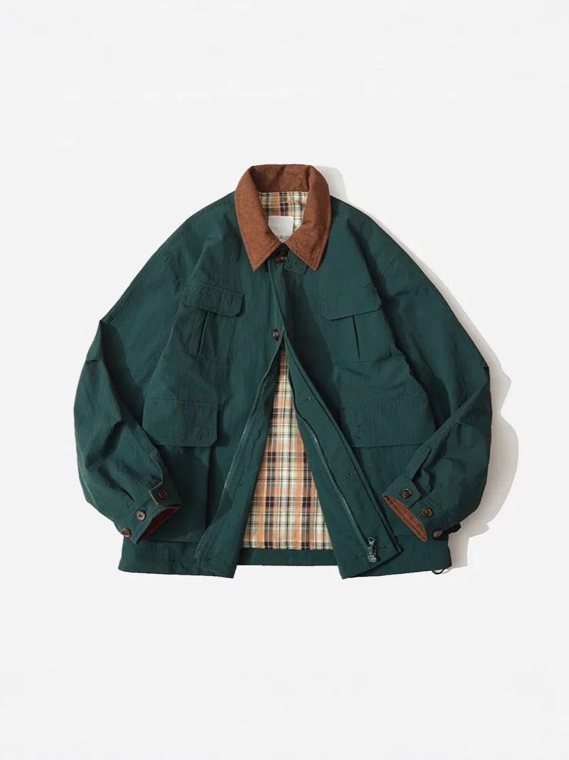 Green and apricot unisex polyester casual jacket with side seam pockets on a hanger
