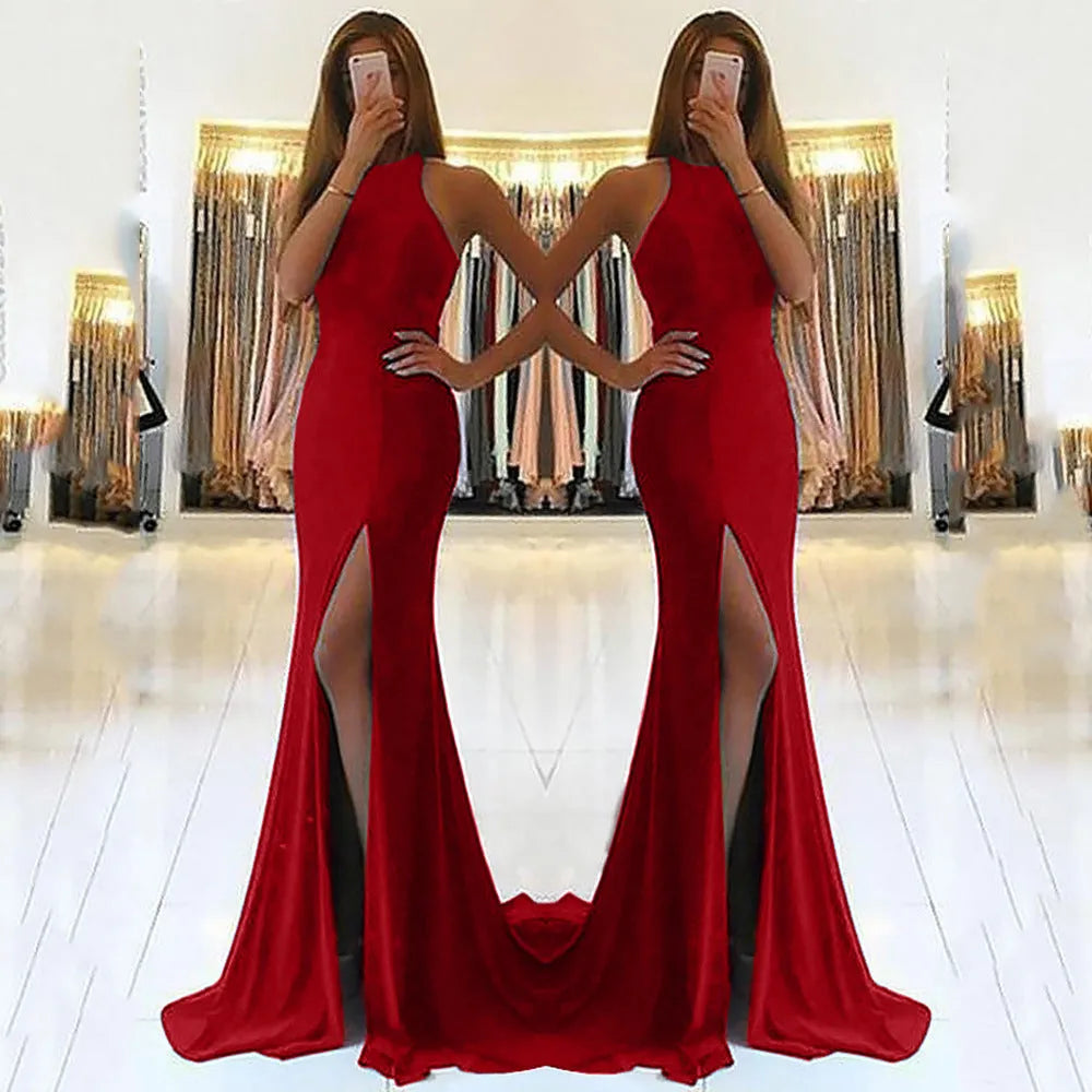 Red long evening dress with hollow detailing, high waist, and large swing skirt made from knitting fabric.