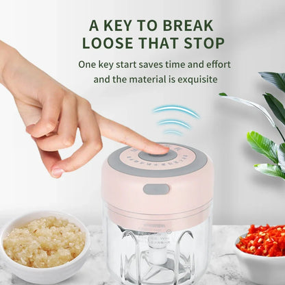 Mini electric garlic chopper with stainless steel blades in green, pink, or white with USB charging cable