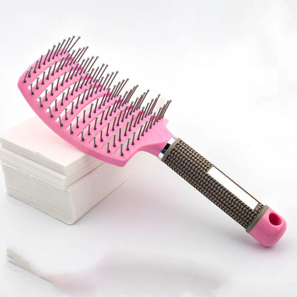 Large curved hairbrush with boar bristles showing 15cm width and natural bristle distribution