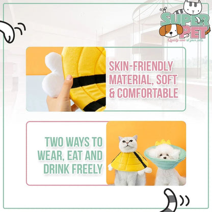 Soft fabric cat cone collar with cute bee design and Velcro closure on a table