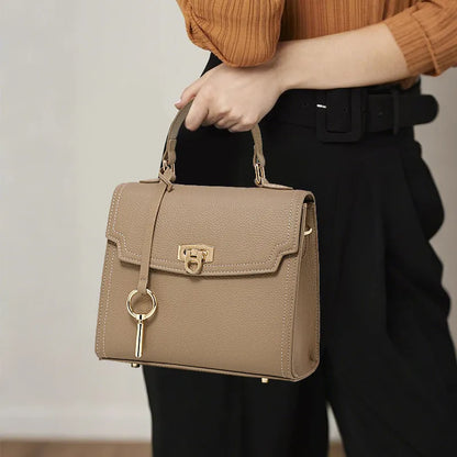 Elephant grey vintage handbag with litchi pattern leather and antique lock