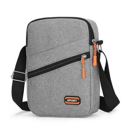 Oxford cloth crossbody commuter bag with contrast colour trim in silver grey