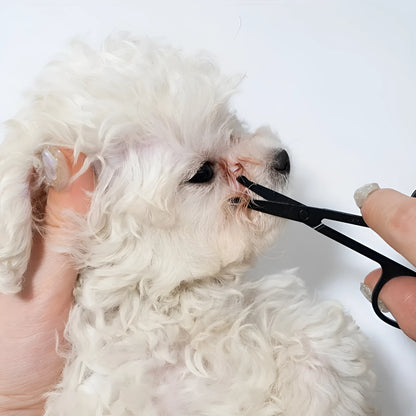 Black pet grooming brush with silicone bristles and plastic comb for dog and cat eye care.