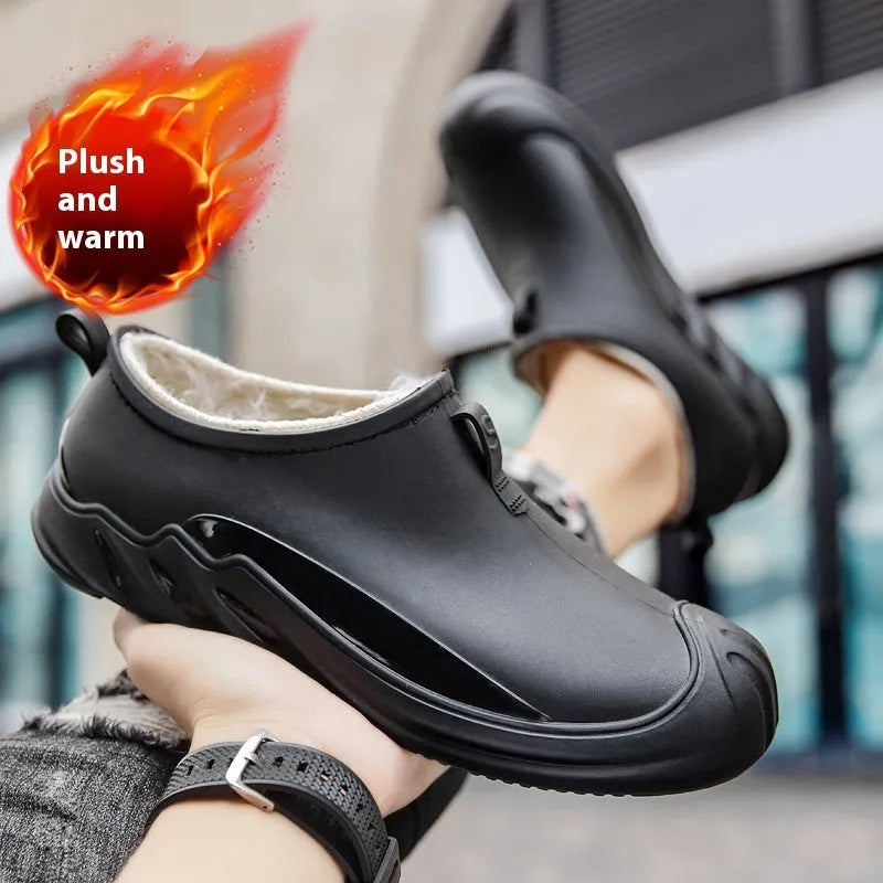 Men's short black plastic rain boots showing casual design and waterproof construction