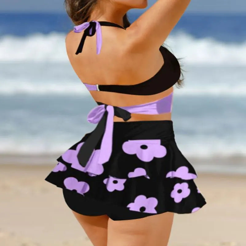 Purple and black women's high waist bikini set with lace-up top and separate swim skirt.