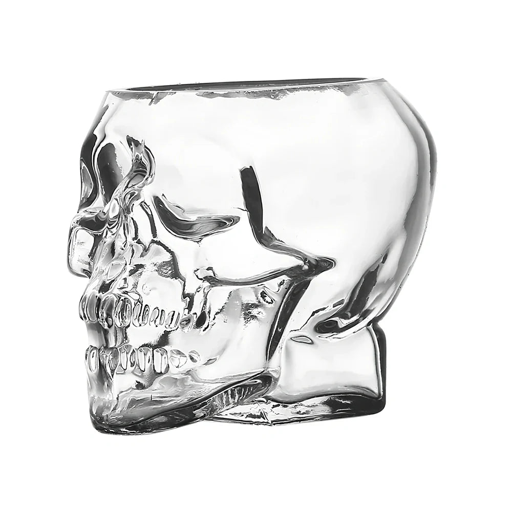 Transparent skull-shaped wine glass with detailed features and 160ml capacity measurement