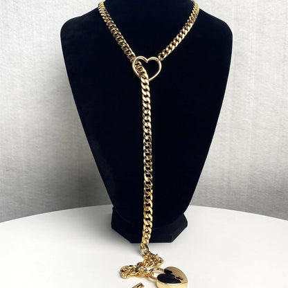 Adjustable heart-shaped O-ring slip chain necklace in black, silver, and gold