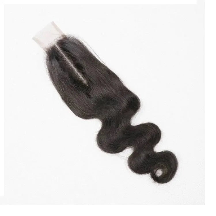 Straight natural colour human hair wig with hand-woven cap on a wig stand.