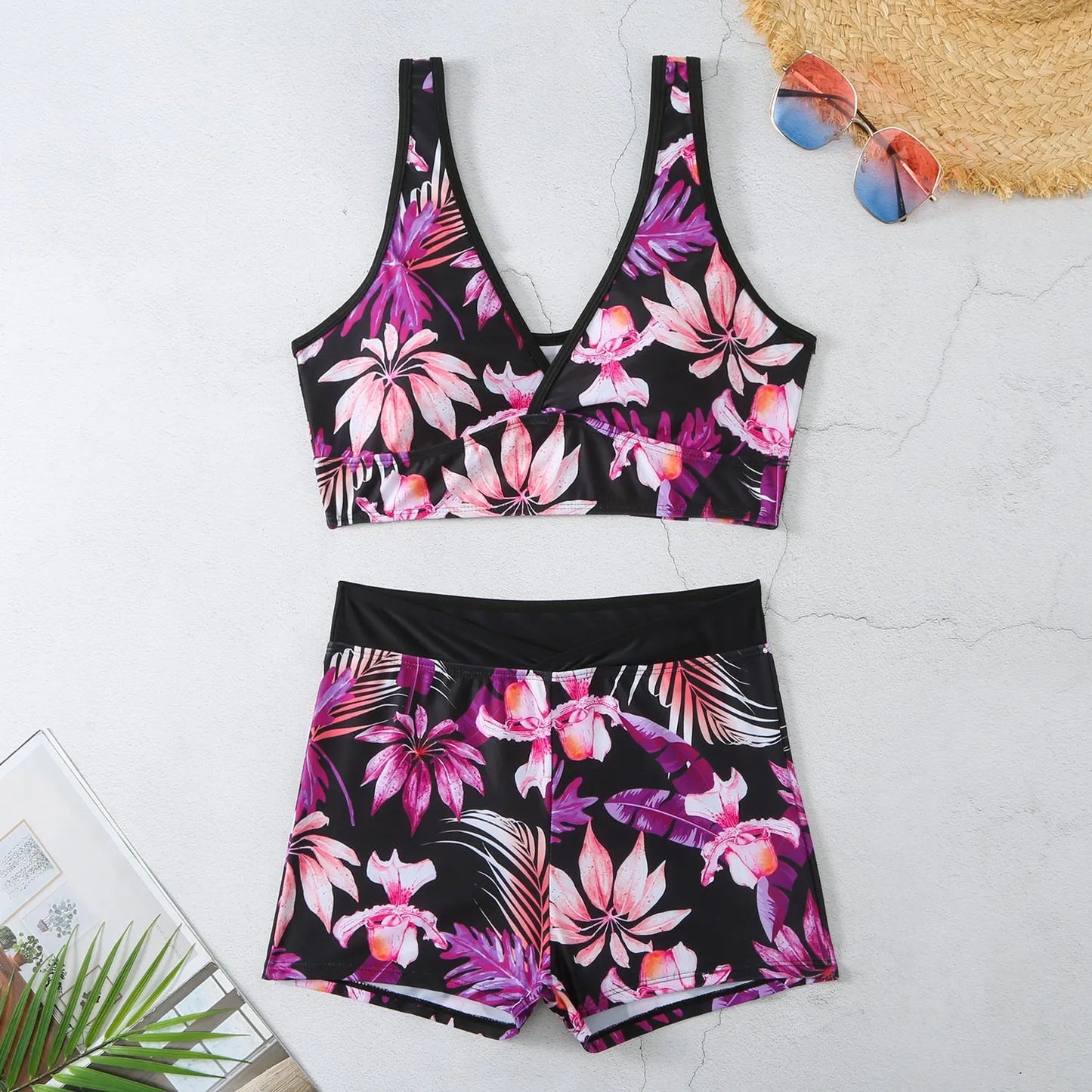 Women's two-piece printed swimsuit set with boxer-style briefs and sleeveless top in multi-colour pattern