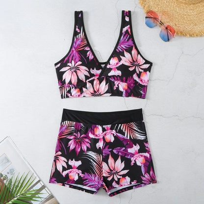 Women's two-piece printed swimsuit set with boxer-style briefs and sleeveless top in multi-colour pattern