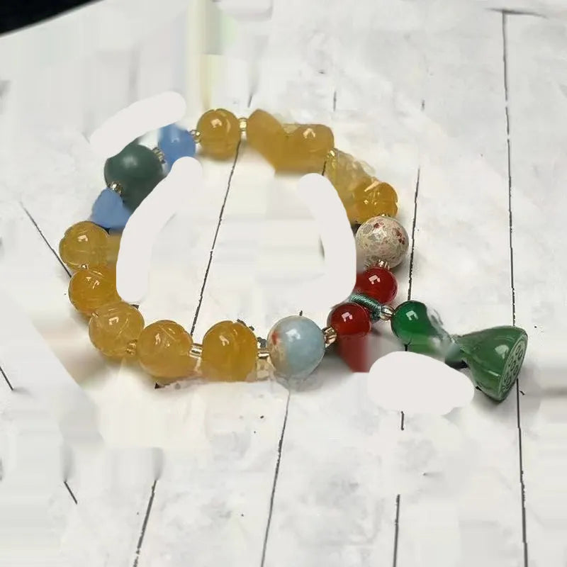 White Bodhi root bracelet with carved pumpkin lotus beads including Apple Orchard and Duobao styles