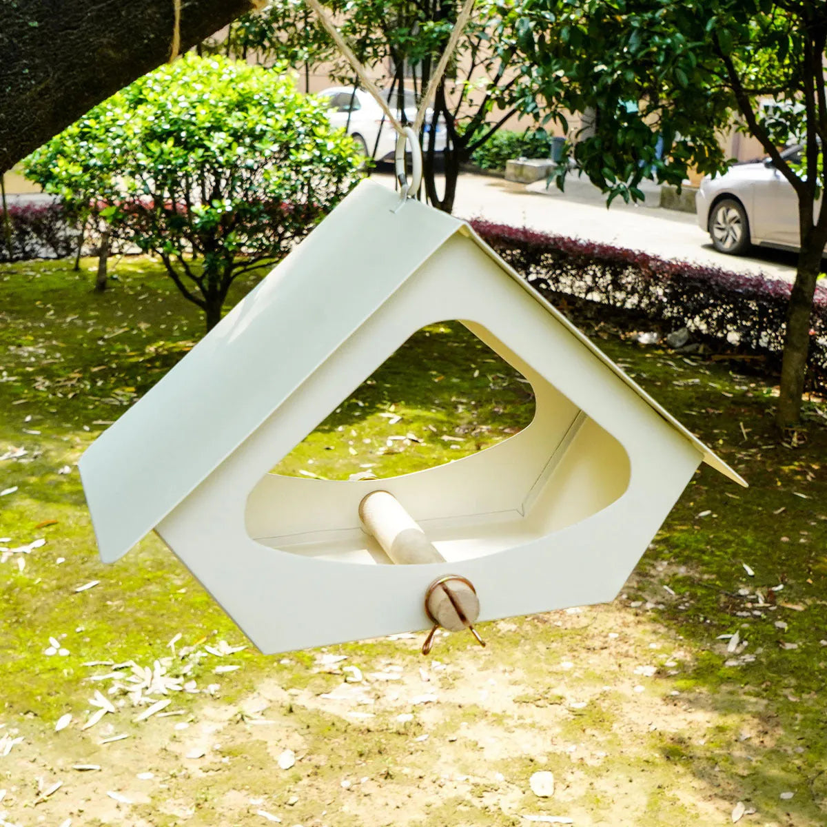 European-style iron bird nest feeder in garden setting, available in black or brown colours