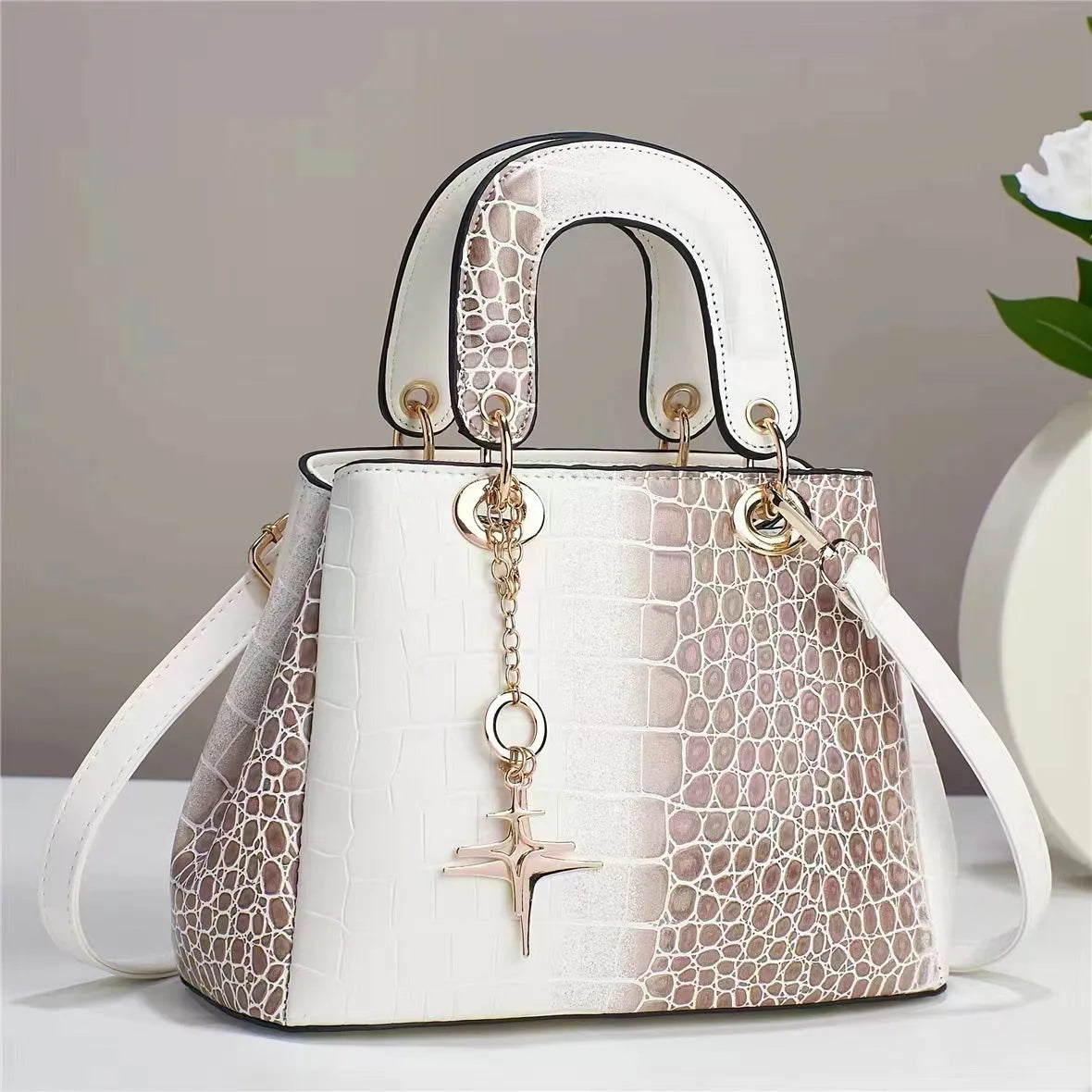 Women's PU shoulder bag with single strap, horizontal square shape, embossed finish and zip change pocket in beige
