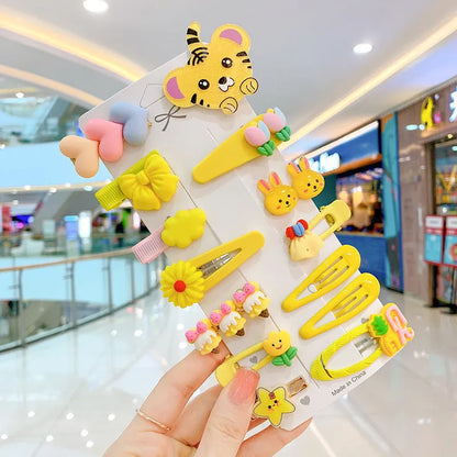 14-piece toddler hair accessories set showing colourful candy rainbow barrettes, fruit clips, and butterfly hair pins