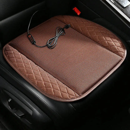 USB ventilated car seat cushion in black suede with leather trim, showing integrated cooling fans and power cable