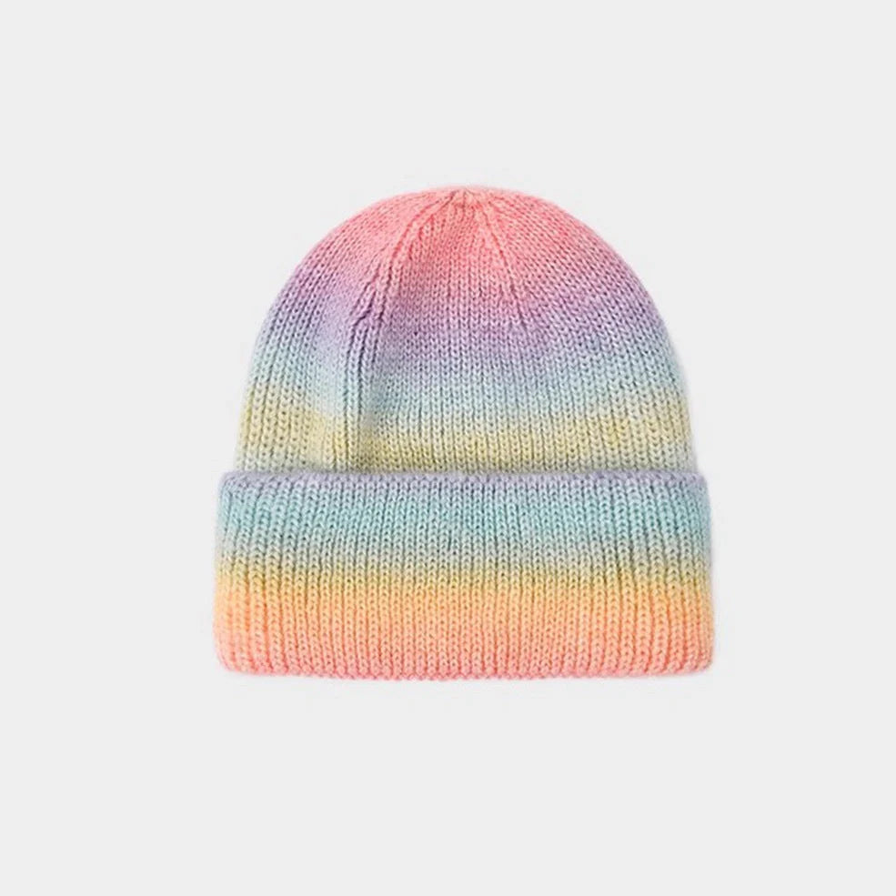 Gradient yarn knitted hat with tapered top in light blue colour showing knitted texture