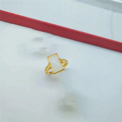 Adjustable brass ring with gold electroplating and inlaid gemstone in national style design