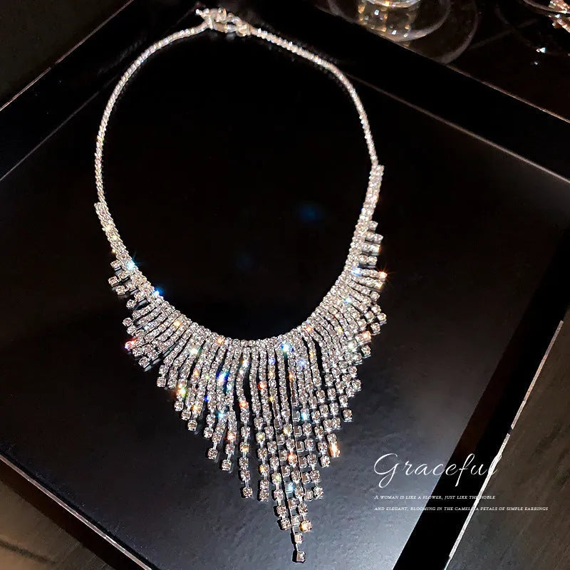 Silver tone tassel necklace with geometric alloy pendant and ball bead chain, 21-50cm circumference